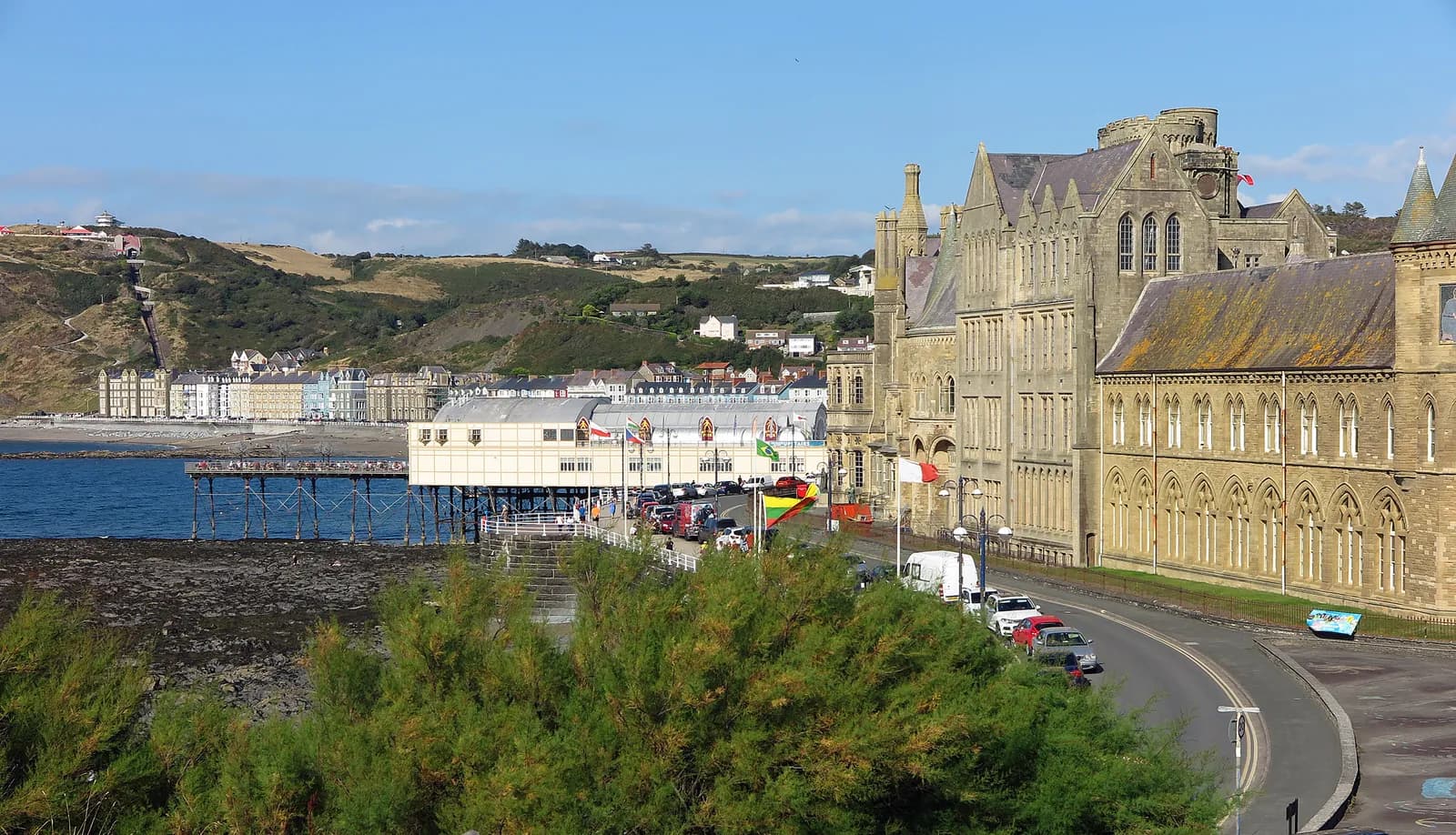 The Old College and the Royal Pier on the Aberystwyth seafront, with Constitution Hill behind