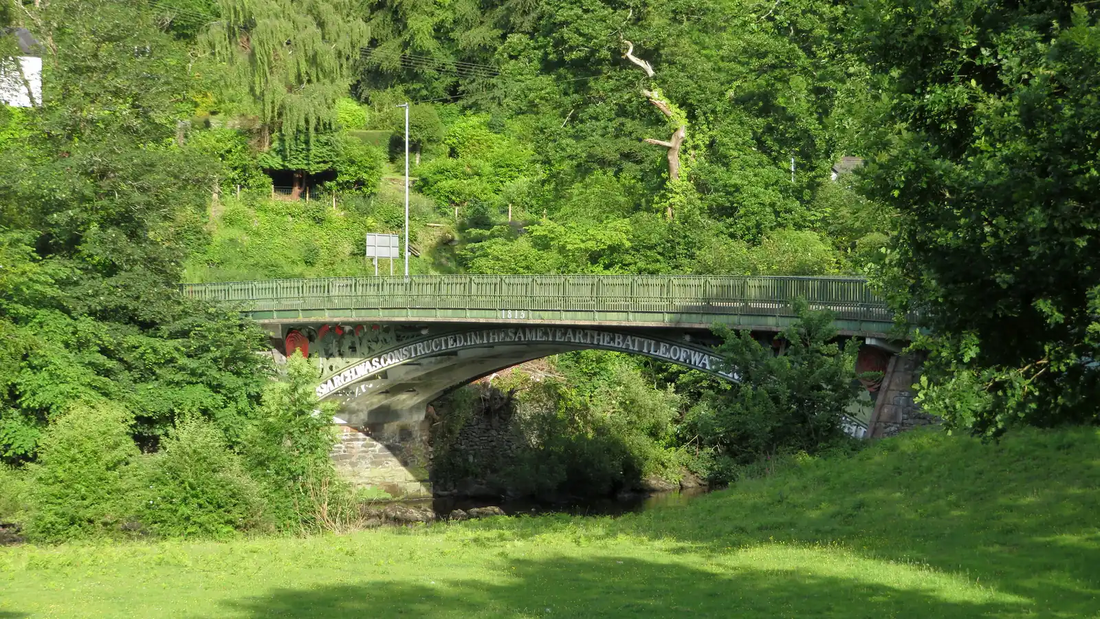 Telford's cast-iron Waterloo Bridge over the Afon Conwy at Betws-y-Coed, with the Waterloo inscription along its arch
