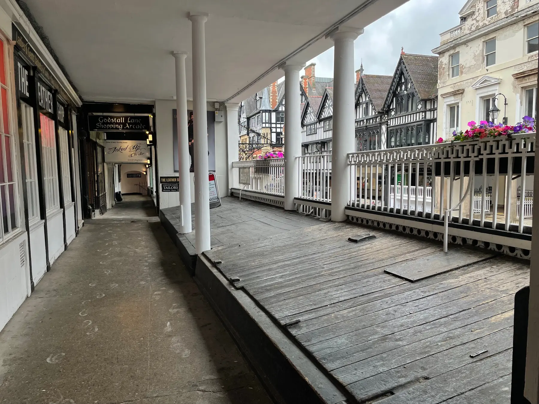 The two-tier Rows on Eastgate Street in Chester, with covered first-floor shopping galleries above street-level shops