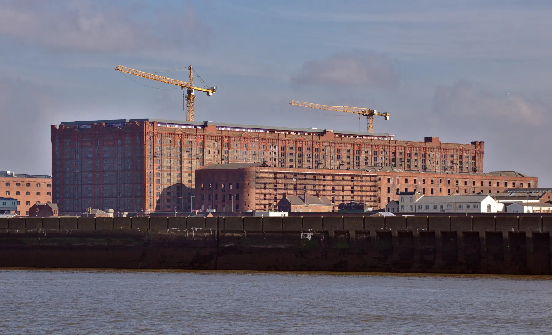 Stanley Dock's Grade II* listed Tobacco Warehouse and North Warehouse seen from the River Mersey, part of Liverpool's historic dock system