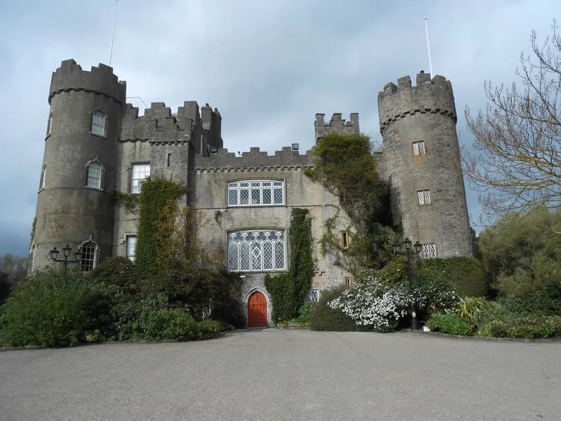 Malahide Castle with formal gardens and medieval towers
