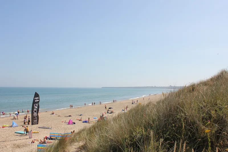 Brittas Bay beach backed by marram-grass dunes on a summer day