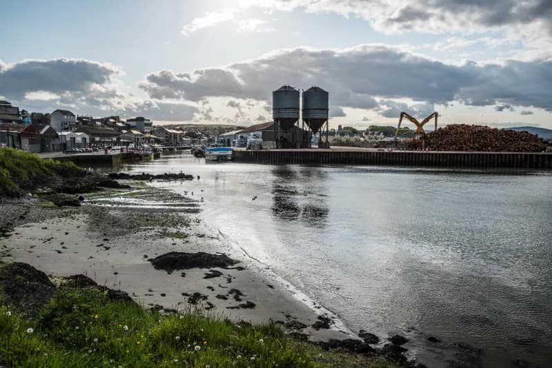 Wicklow Harbour and the East Pier with the timber quay and the town behind