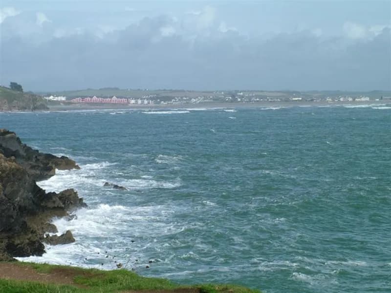 Winter sea off Tramore with the town in the distance from the Guillamene side